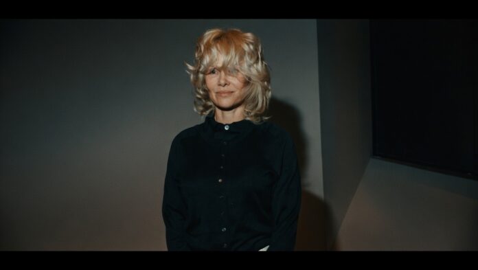 Pamela Anderson NYFW Turns Heads at Tory Burch Show