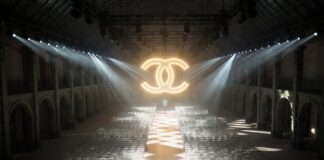 Chanel’s Creative Directors: From Lagerfeld to Viard Grand Parisian fashion show space representing the history of Chanel creative directors from Karl Lagerfeld to Virginie Viard as documented by Runway Magazine