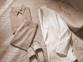 Editorial flat-lay of a 2026 TikTok Shop fashion haul featuring a neutral co-ord set, oversized white blazer, minimalist sandals, and a structured tote in a clean girl aesthetic arrangement.