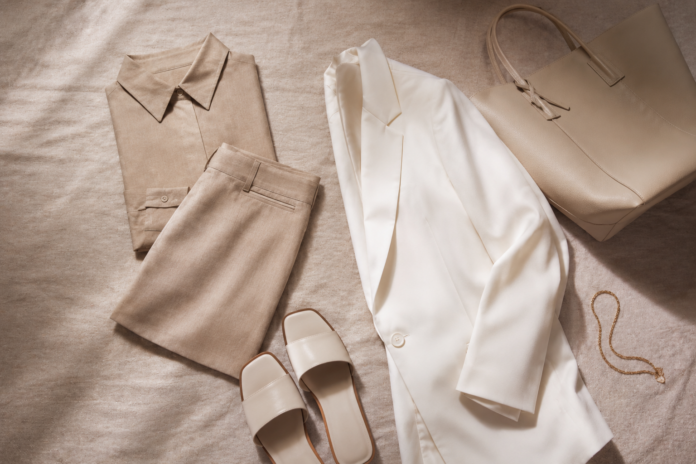 TikTok Shop Fashion Haul 2026 — Viral Women's Picks Editorial flat-lay of a 2026 TikTok Shop fashion haul featuring a neutral co-ord set, oversized white blazer, minimalist sandals, and a structured tote in a clean girl aesthetic arrangement.