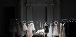Jonathan Anderson’s Dior Era Is Reshaping Luxury Fashion Luxury fashion atelier setting evoking the Jonathan Anderson Dior creative directorship era with precise architectural garments and haute couture craftsmanship representing the most consequential designer appointment in luxury fashion in 2025 2026