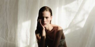 Mona Tougaard Is Emerging as Fashion’s Defining Editorial Model of 2026 Introspective editorial fashion image evoking the editorial photography aesthetic of Mona Tougaard's Vogue Italia June 2026 cover by Malick Bodian styled by Tonne Goodman representing the luxury runway model career of the Danish model as fashion editorial star of 2026